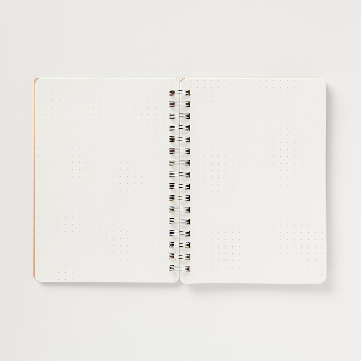 Kołonotatnik z gumką w kropki 70 kartek A6 beżowy