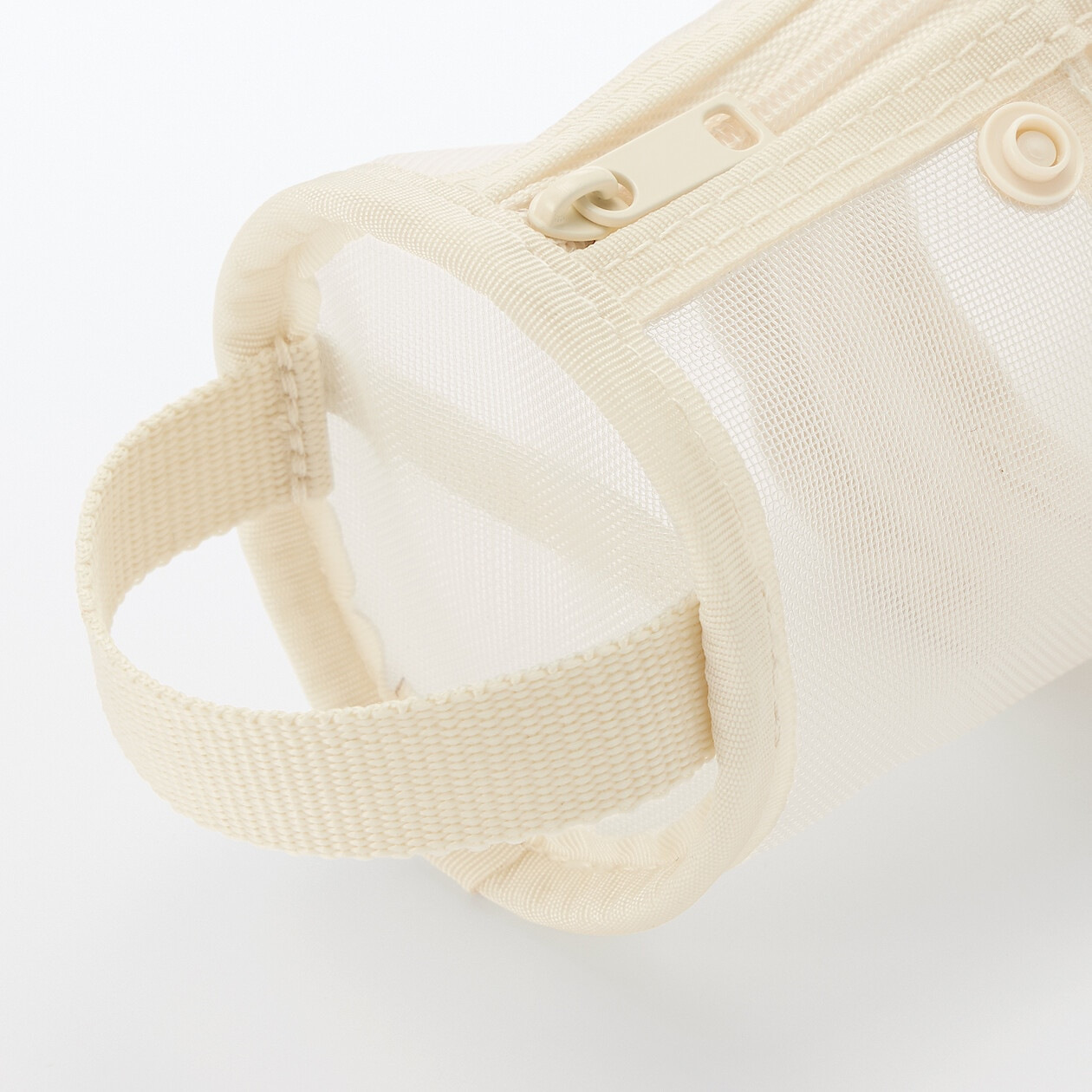 Piórnik okrągły z nylonowej siatki kremowy