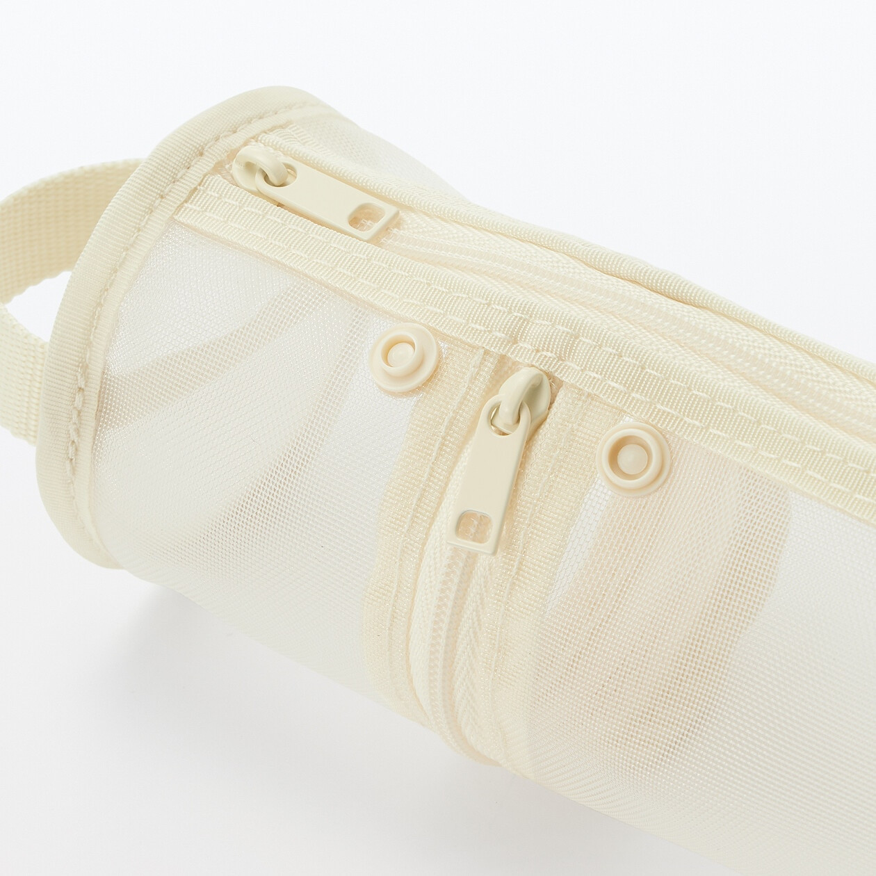 Piórnik okrągły z nylonowej siatki kremowy