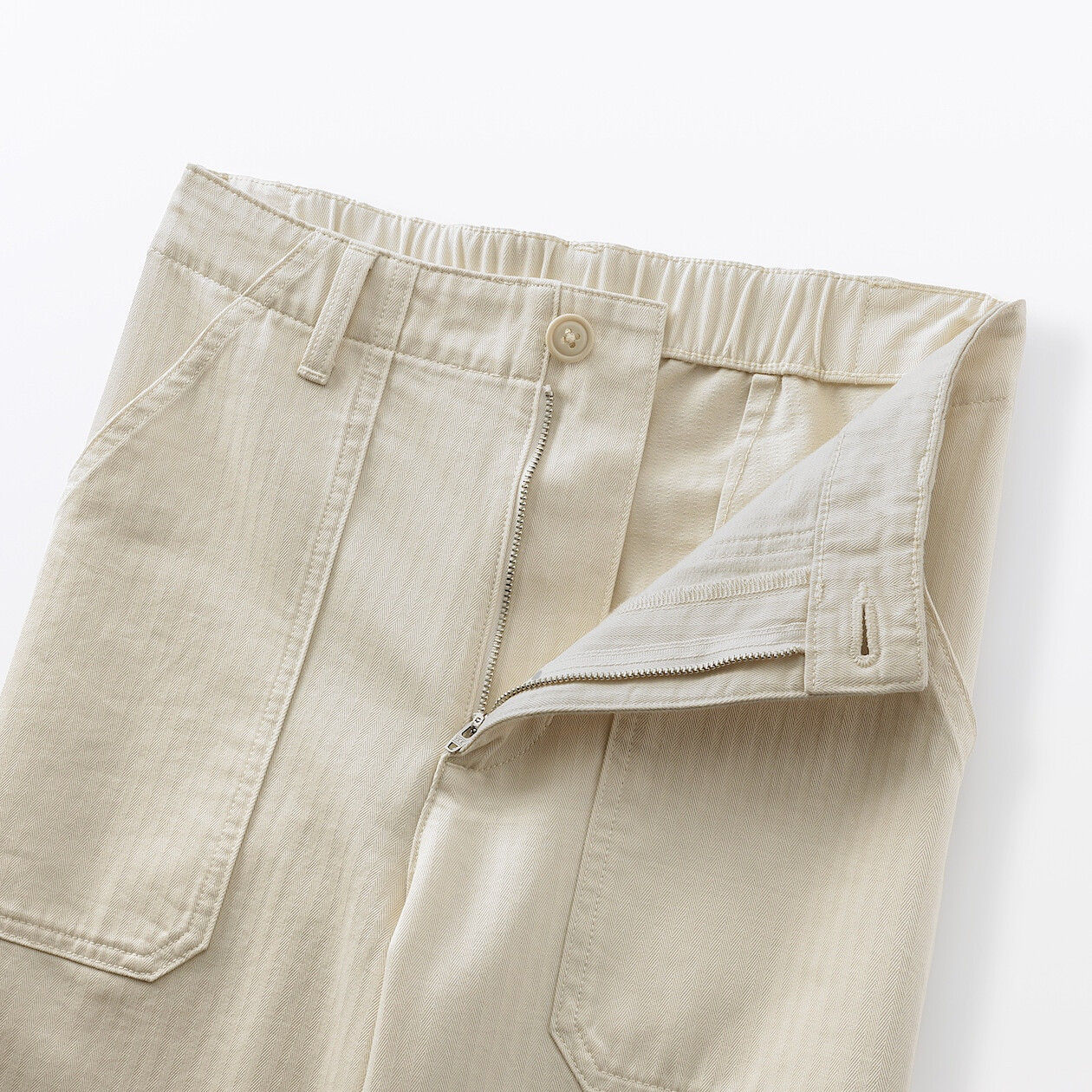 Spodnie z kieszeniami w jodełkę kremowe